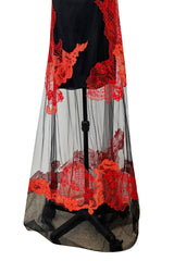 Resort 2011 Givenchy by Ricardo Tisci Look 5 Red Lace & Black Net Dress
