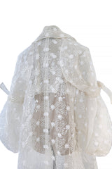 Spring 2017 Simone Rocha Runway Look 6 Transparent Raincoat w Embroidered Tulle Backing