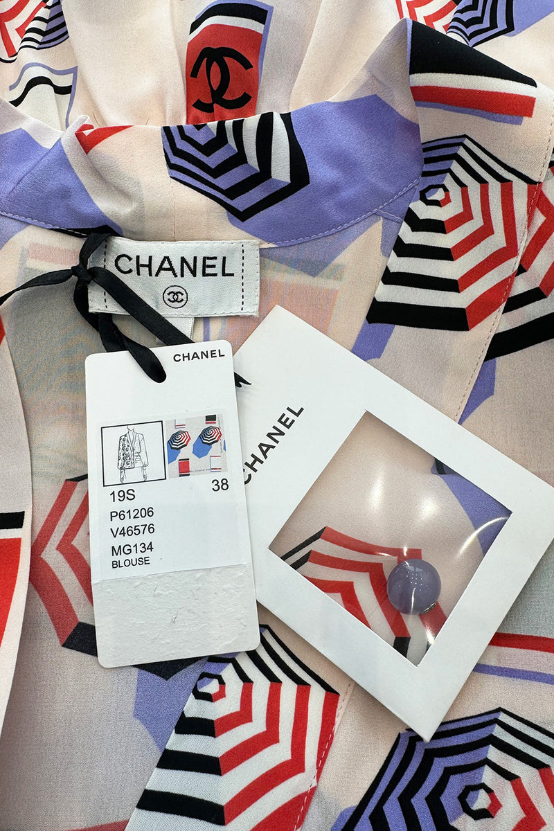 Spring 2019 Chanel by Karl Lagerfeld Runway Look 34 Blush Pink Silk Top w Parasol Print