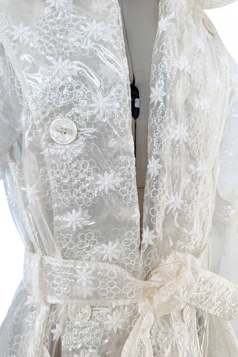 Spring 2017 Simone Rocha Runway Look 6 Transparent Raincoat w Embroidered Tulle Backing