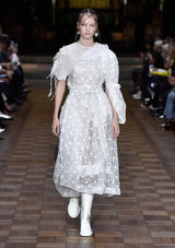 Spring 2017 Simone Rocha Runway Look 6 Transparent Raincoat w Embroidered Tulle Backing