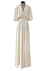 1970s Halston Draped Minimal Seamed Ivory Jersey Wrap Over Dress w Full Sleeves