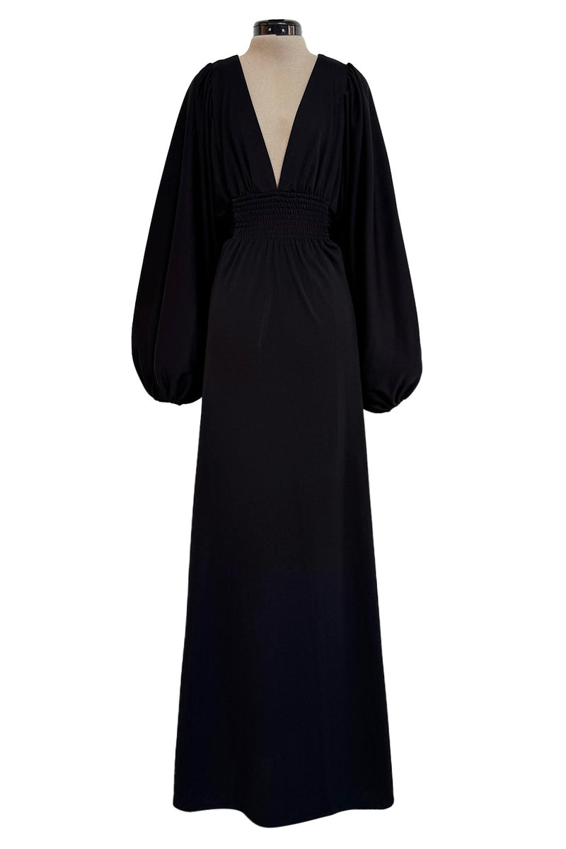 70s black dress with sleeves Black 70s midi dress with sequin high neck and balloon sleeves. Size 1 Olive & Quince Vintage