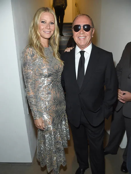 Spring 2018 Michael Kors Runway Look 72 Silver Sequin Dress on Nude Stretch Net w Asymmetrical Hem