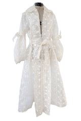 Spring 2017 Simone Rocha Runway Look 6 Transparent Raincoat w Embroidered Tulle Backing