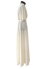 1970s Halston Draped Minimal Seamed Ivory Jersey Wrap Over Dress w Full Sleeves