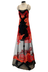 Resort 2011 Givenchy by Ricardo Tisci Look 5 Red Lace & Black Net Dress