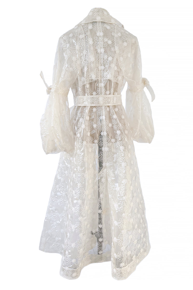 Spring 2017 Simone Rocha Runway Look 6 Transparent Raincoat w Embroidered Tulle Backing