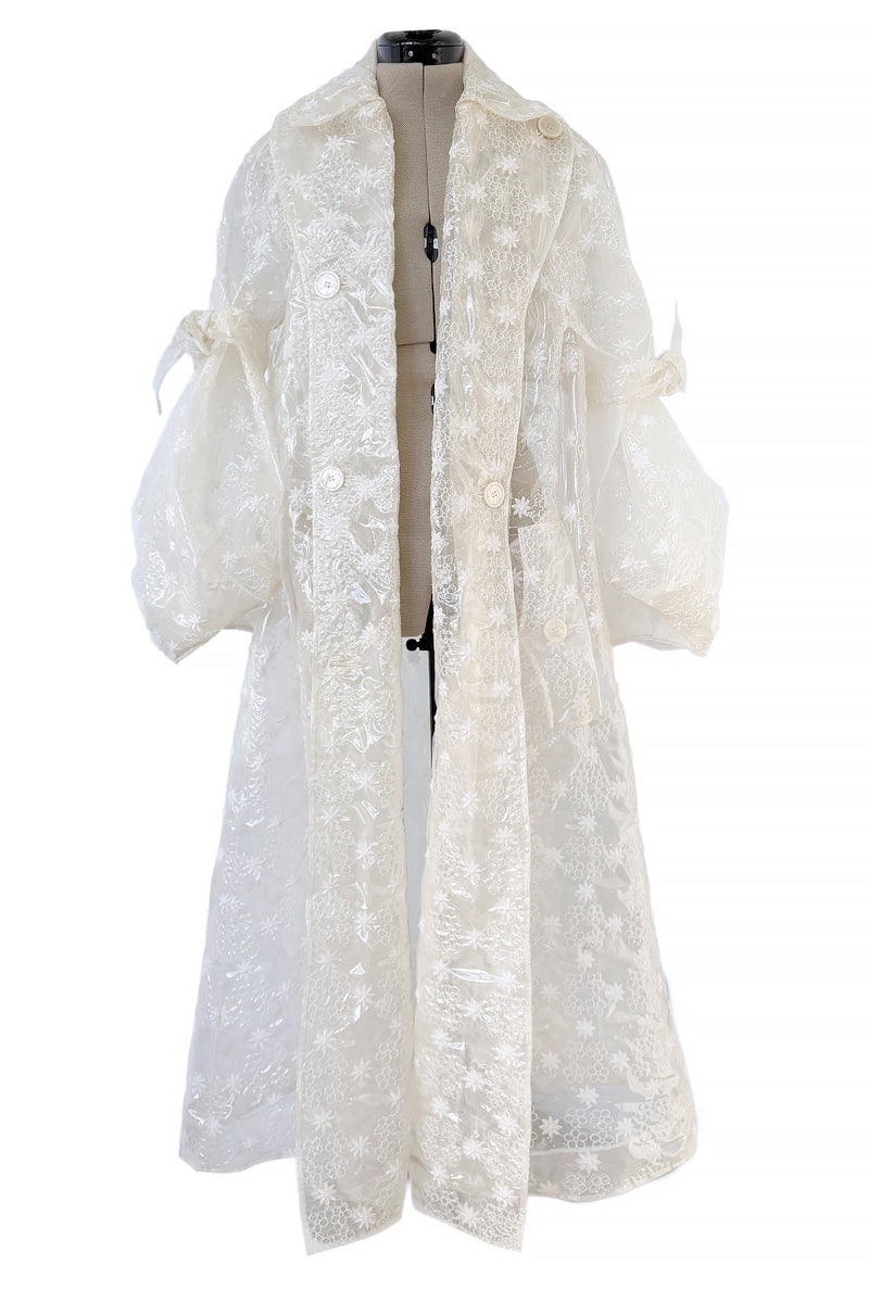 Spring 2017 Simone Rocha Runway Look 6 Transparent Raincoat w Embroidered Tulle Backing
