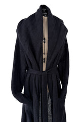 Fall 2023 Saint Laurent by Anthony Vaccarello Mens Runway Look 13 Long Super Soft Knit Coat