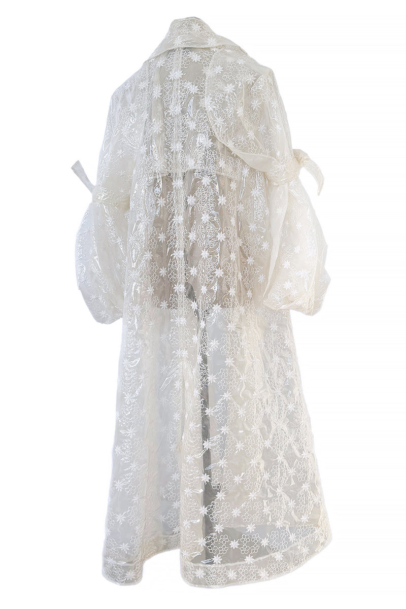 Spring 2017 Simone Rocha Runway Look 6 Transparent Raincoat w Embroidered Tulle Backing