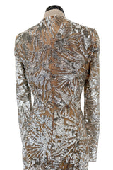 Spring 2018 Michael Kors Runway Look 72 Silver Sequin Dress on Nude Stretch Net w Asymmetrical Hem