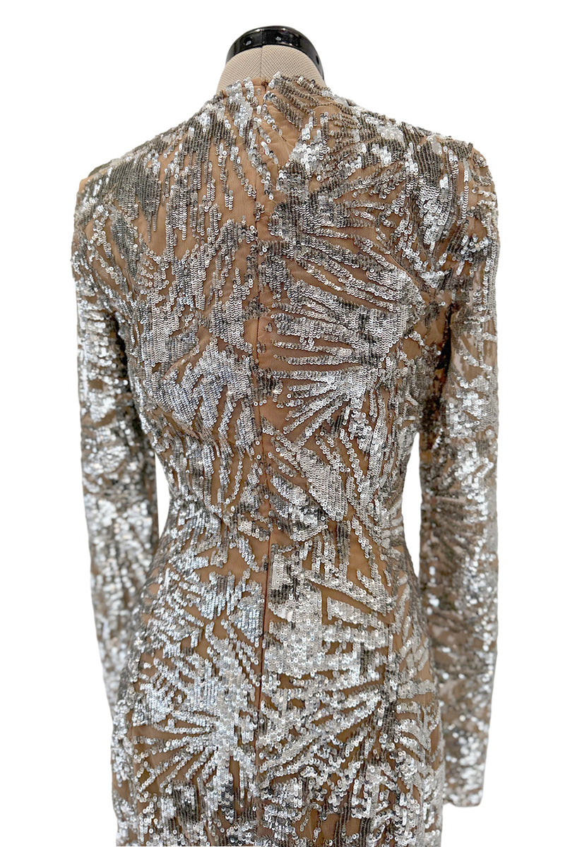 Spring 2018 Michael Kors Runway Look 72 Silver Sequin Dress on Nude Stretch Net w Asymmetrical Hem