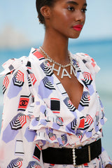 Spring 2019 Chanel by Karl Lagerfeld Runway Look 34 Blush Pink Silk Top w Parasol Print