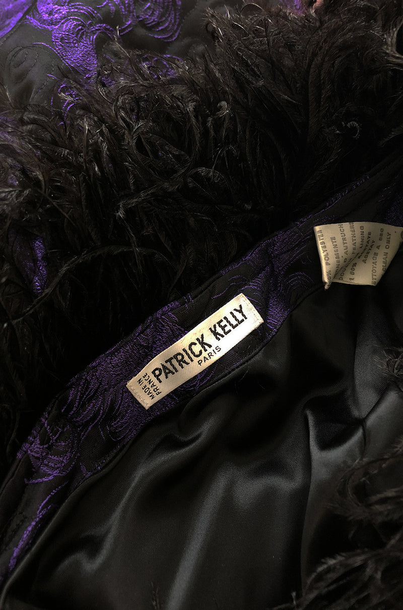 c.1988 Patrick Kelly Purple Brocade One Shoulder Feather Trim Dress
