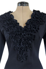 Fabulous Little Late 1950s Unlabeled Black Wool Jersey Ruffled Hem & Collar Dress
