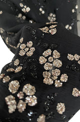 Late 1970s Pauline Trigere Black Silk Chiffon Dress w Silver Fused Glitter Flower Design
