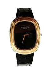 1970s Patek Philippe Yellow Gold Ellipse with Onyx Dial