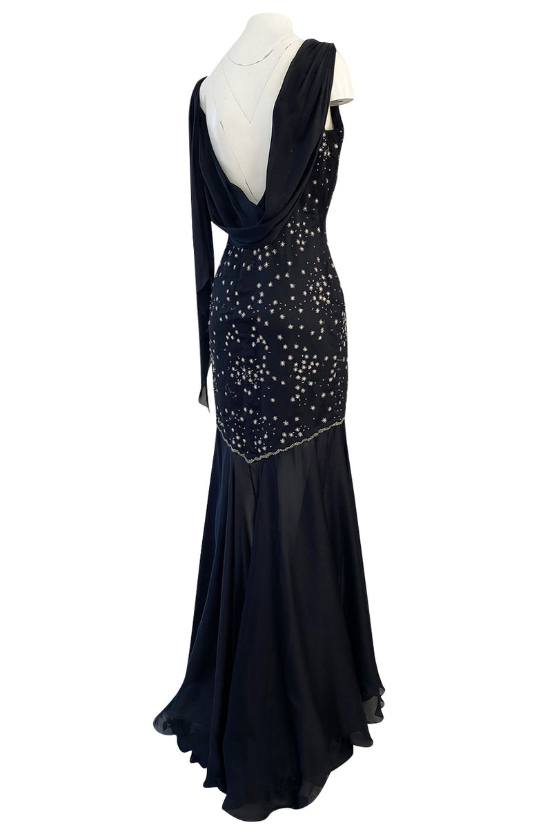 1980s Genny Draped Backless Black Silk Dress w Silver Star Thread Detailing