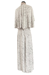 1970s James Galanos Soft Pale Grey & White Floral Print Silk & Silk Chiffon Caped Dress