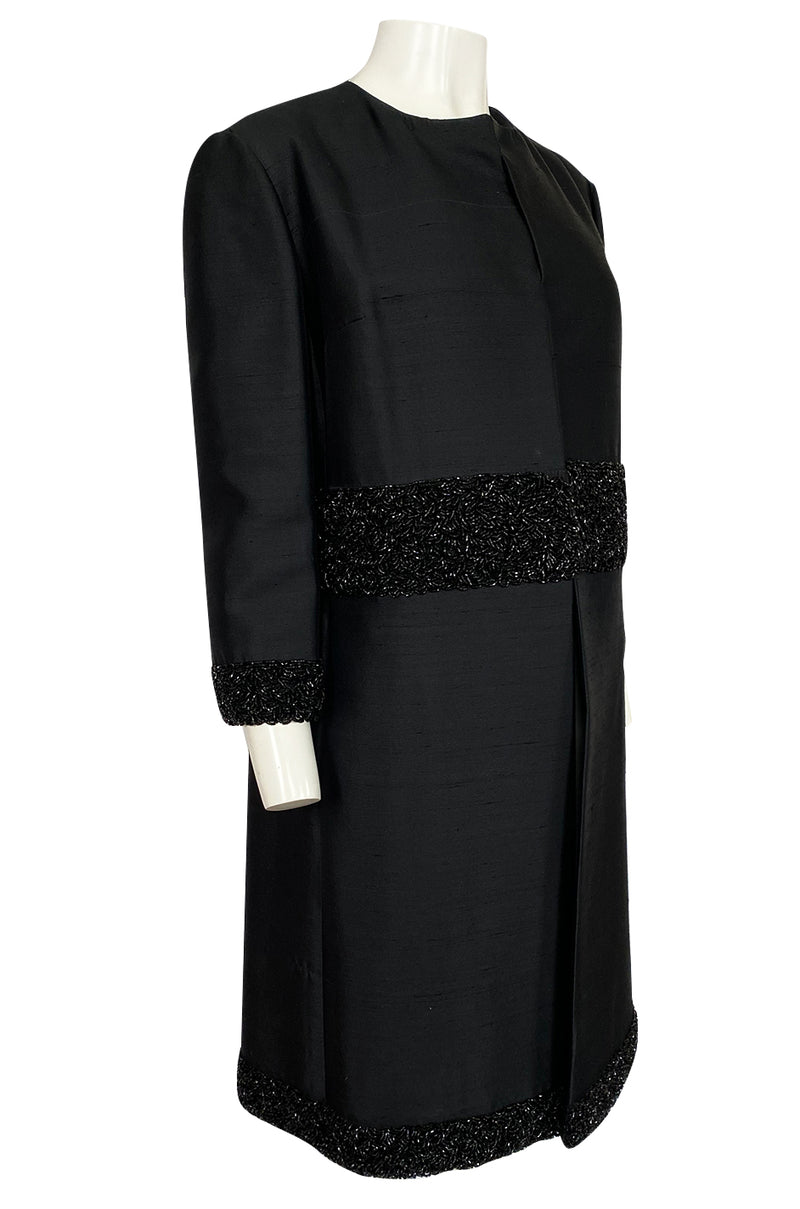 1950s Black Silk Evening Coat w Heavy Beading at the Hem, Cuffs & Waist