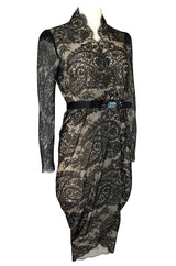 Fall 2010 Alexander McQueen Black Scalloped Lace Wrap Dress