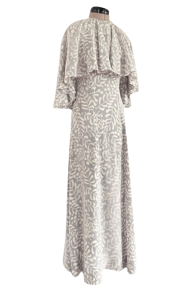 1970s James Galanos Soft Pale Grey & White Floral Print Silk & Silk Chiffon Caped Dress