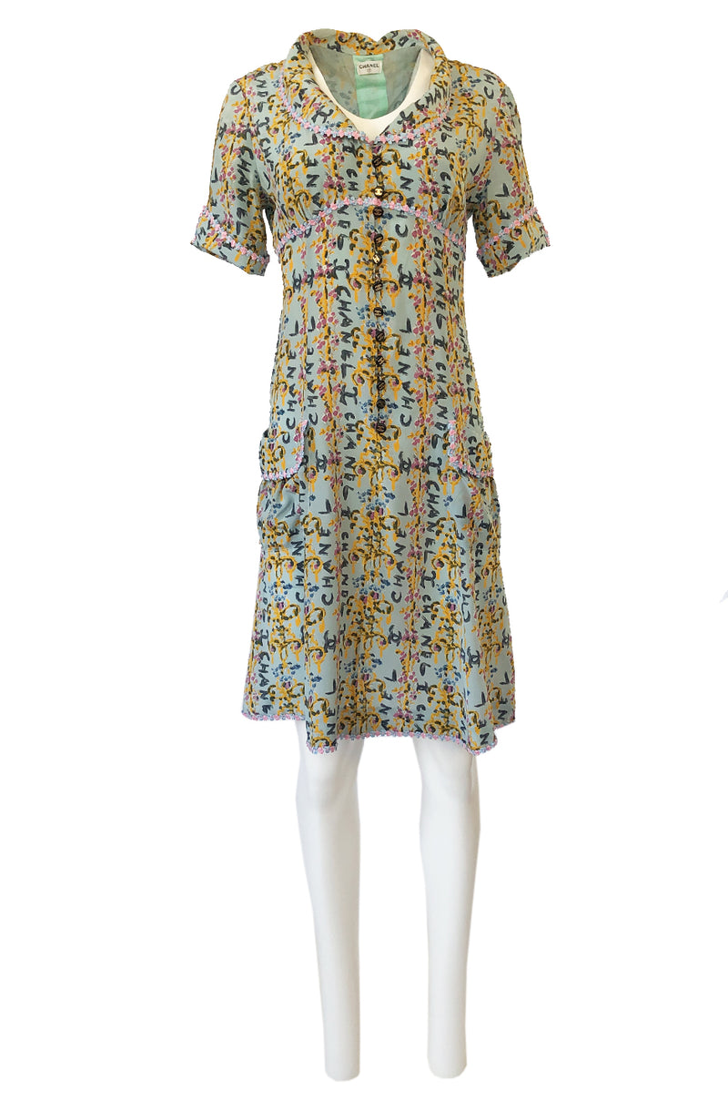 1990s Chanel Logo Printed Blue Silk Dress w Pink & Blue Floral Ribbon Shrimpton Couture 1990s Chanel Logo Printed Blue Silk Dress w Pink & Blue Floral Ribbon Shrimpton Couture