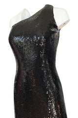 Fall 1974 Bill Blass One Shoulder Glossy Black Sequin Dress with Fringe Hem