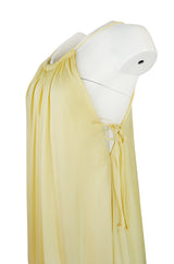 1970s Unlabeled Light Yellow Jersey Layered & Tiered Halter Dress