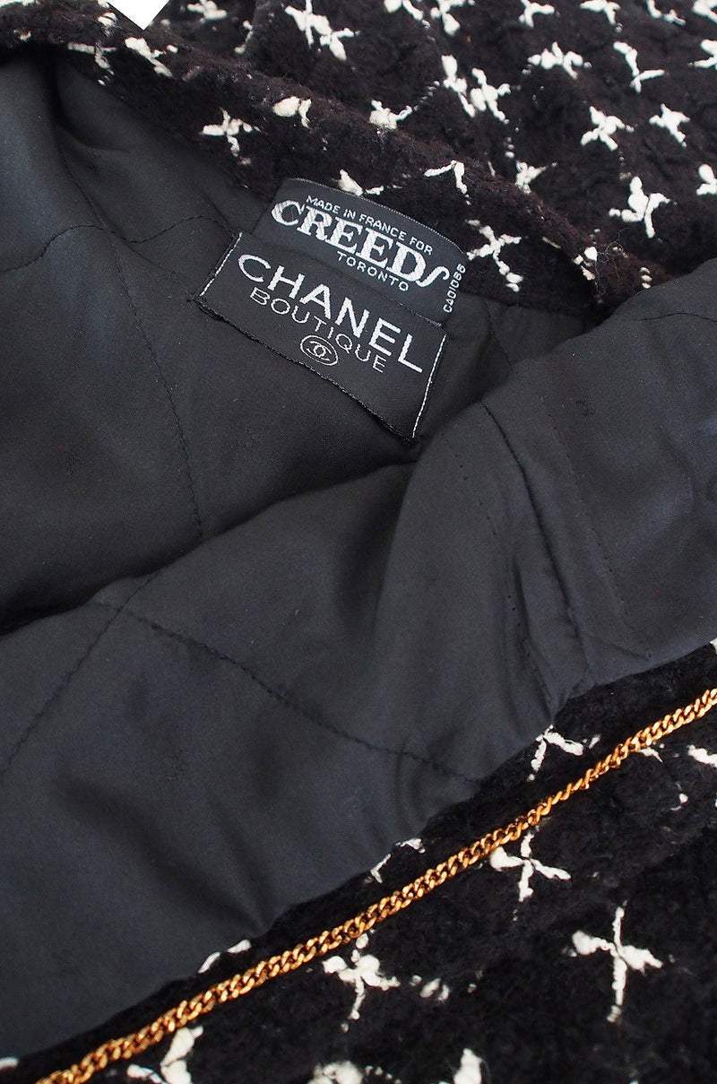 1980s Pearl Button Chanel Larger Boucle Suit