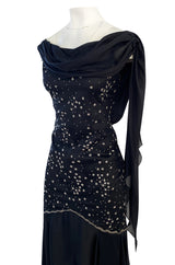 1980s Genny Draped Backless Black Silk Dress w Silver Star Thread Detailing