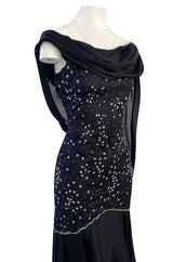 1980s Genny Draped Backless Black Silk Dress w Silver Star Thread Detailing